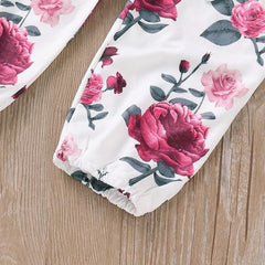 Barboteuse à volants, pantalon fleuri et bandeau